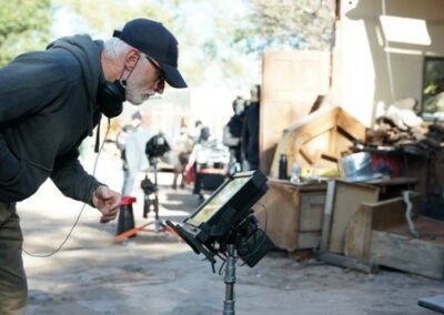 man looking at monitor on film set